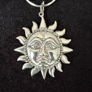 Vintage Sun Face with rays pendant in stamped 925 Sterling Silver.
